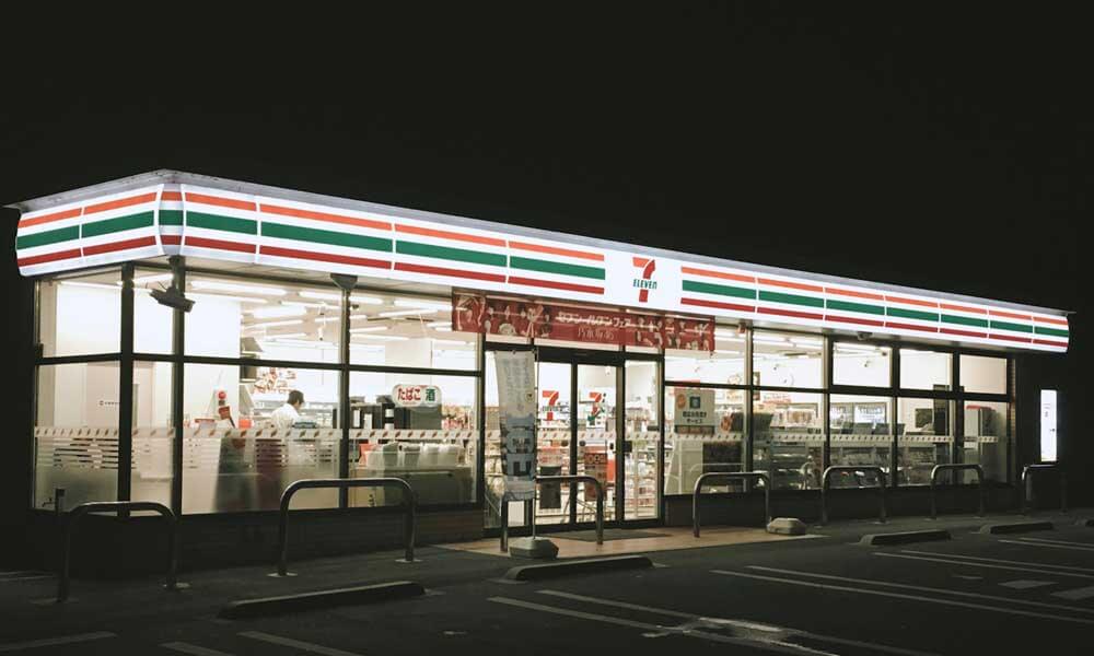 7-Eleven store sign lit up in the night