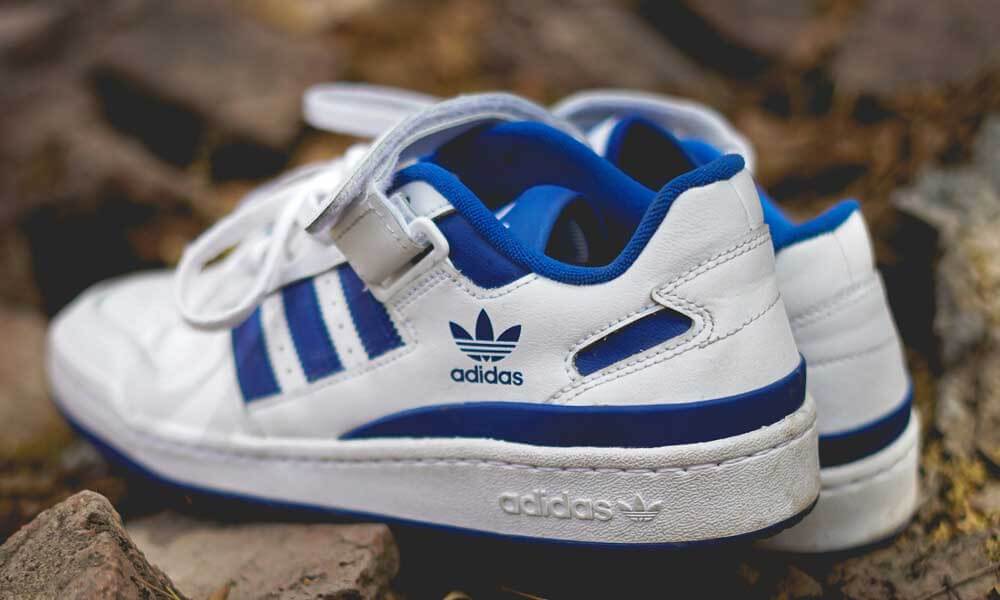 Blue and white Adidas shoes
