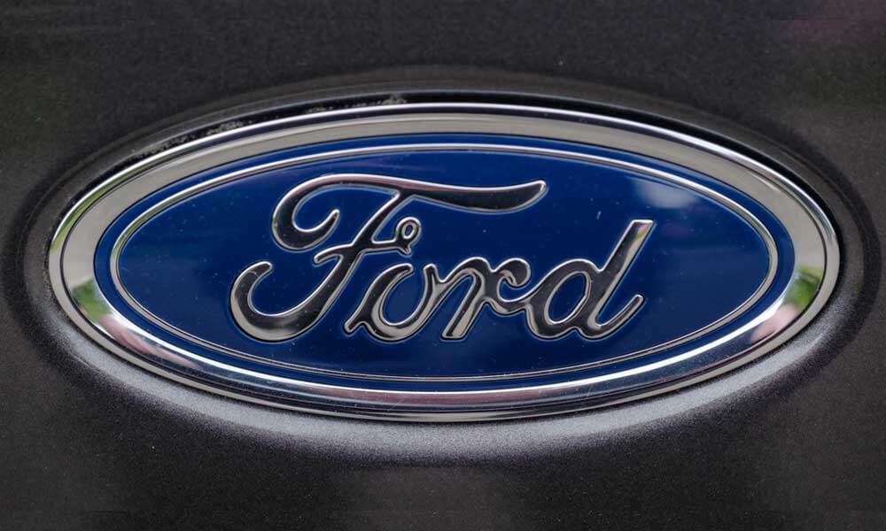 Closeup of Ford logo on car