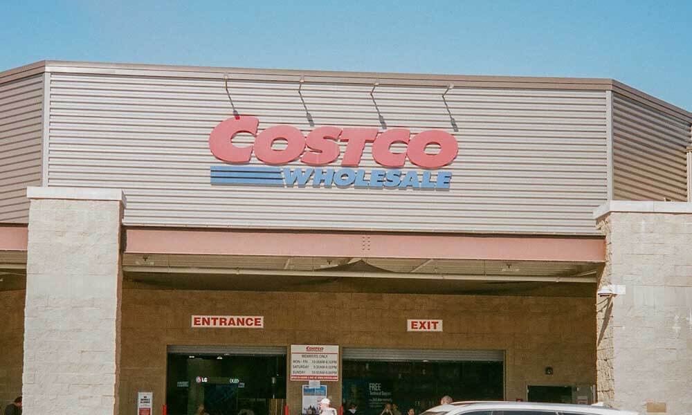 Costco Wholesale logo sign in front of store