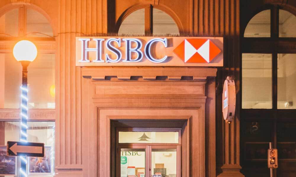 HSBC bank sign logo in front of building