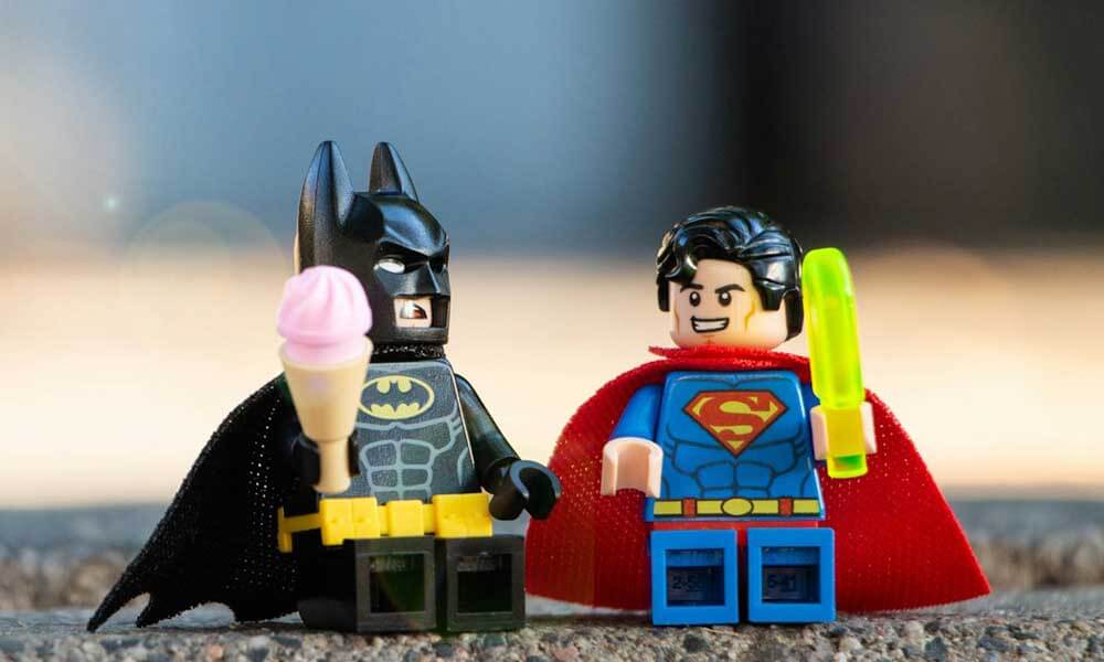 Lego Superman and Batman mini-figures having ice cream