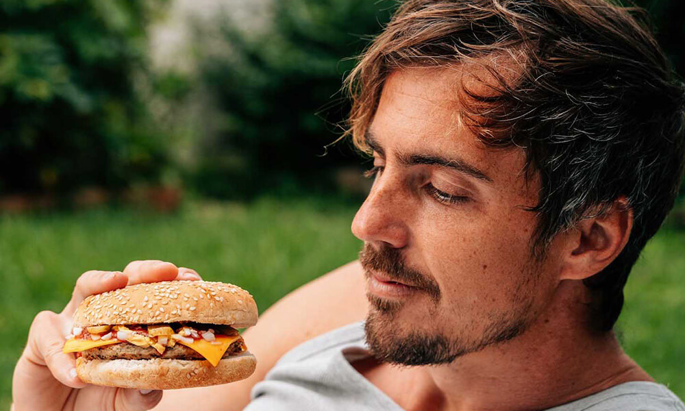 Man eating Burger
