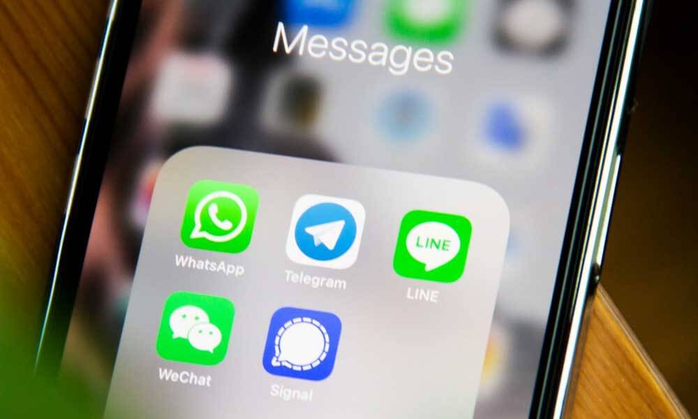 Mobile phone showing Telegram app icon
