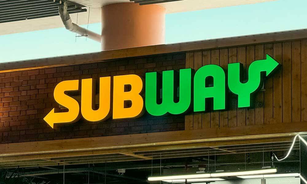 Subway sign in front of store